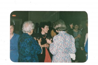 Tess talking to Miss David at the 550th anniversary party.